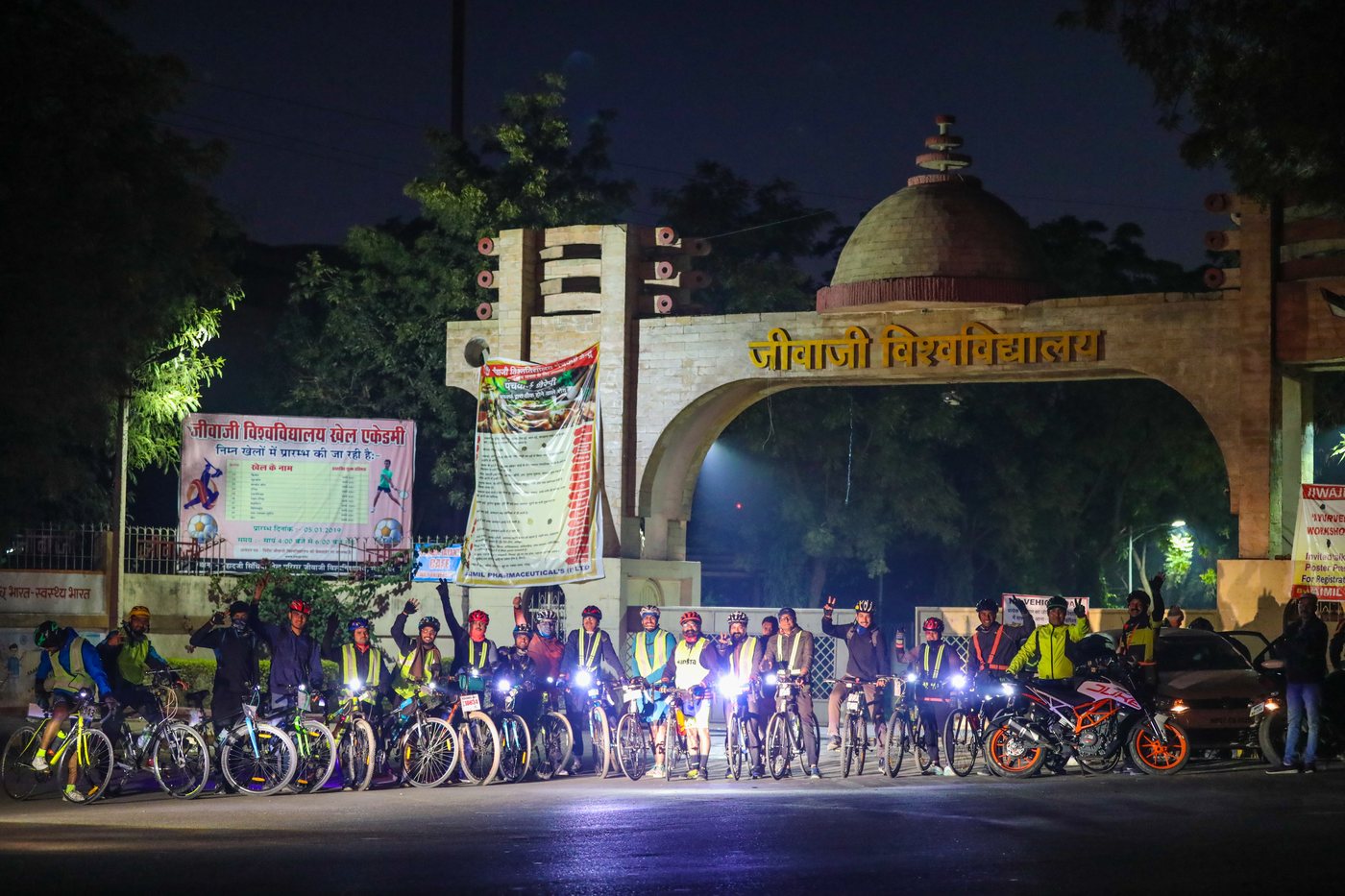 Cyclists gathered at night for a Gwalior Audax ride